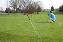 Sand-wedge neatly supported on Golf-Rest. Click to enlarge.