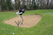 'On the Back-swing'. Putter/Wedge neatly supported on Golf-Rest. Click to enlarge.